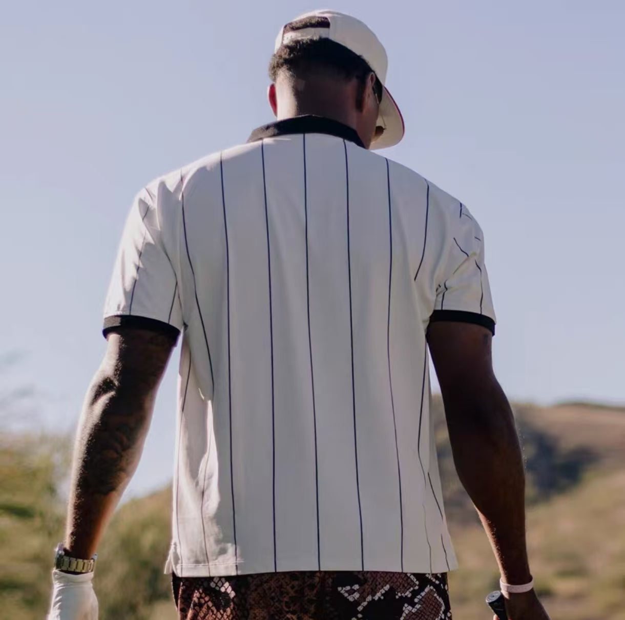 Devereux striped golf polo full outfit on male model