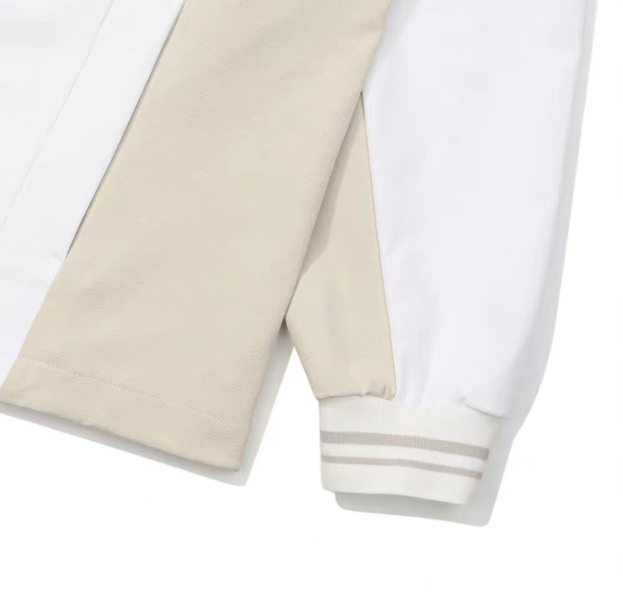 Malbon women's golf jacket sleeve cuff and panel detail
