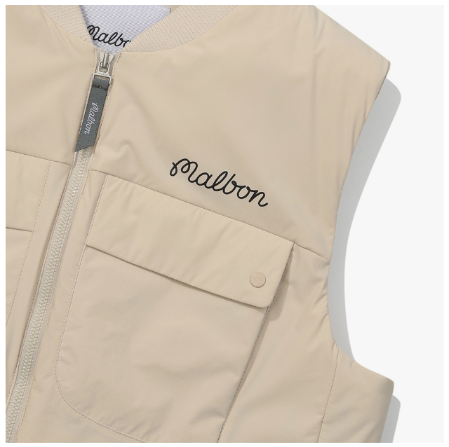 Malbon women's lightweight cargo windproof golf vest in Beige, fabric and hem detail