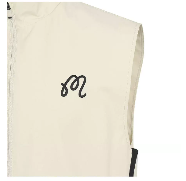 Beige Malbon golf vest shoulder and logo detail