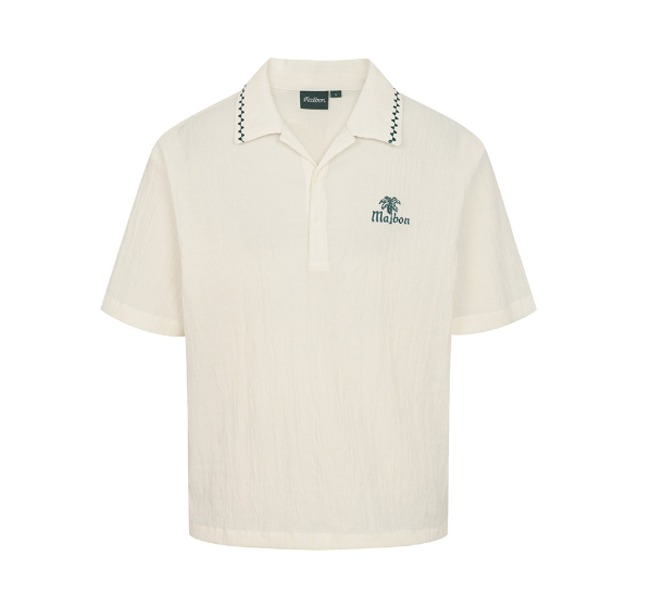 Malbon men's textured quick-dry lightweight golf polo in White - front view