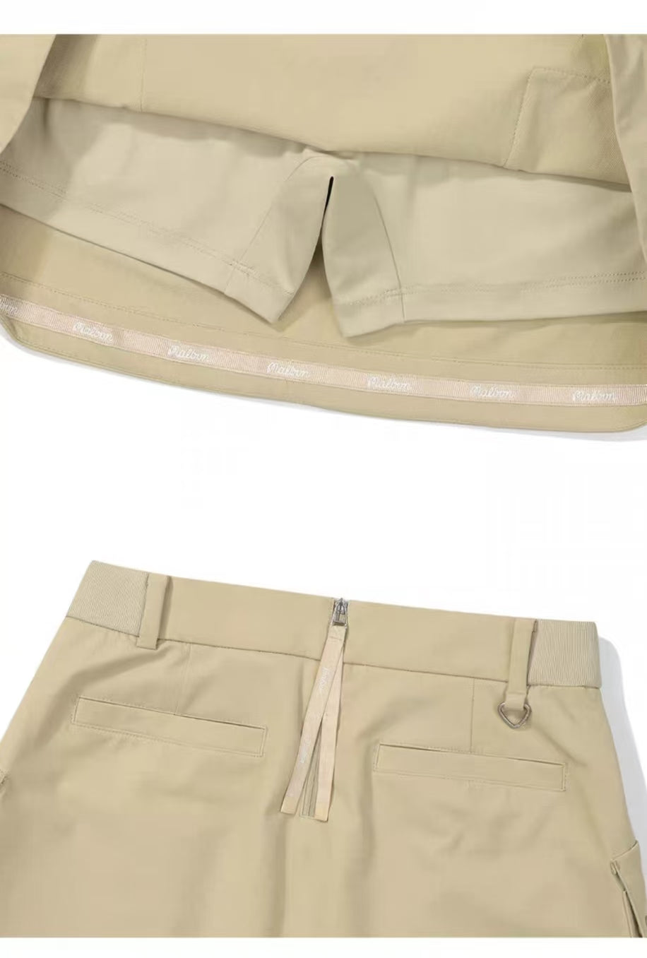 Malbon women's solid pleated golf skort with pockets in Khaki, pocket and trim detail