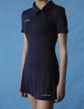 NowRose Navy asymmetrical golf polo detail on model