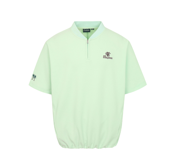Malbon women's Loose Fit Quarter-Zip Casual Golf Shirt in Mint Green, logo and fabric detail