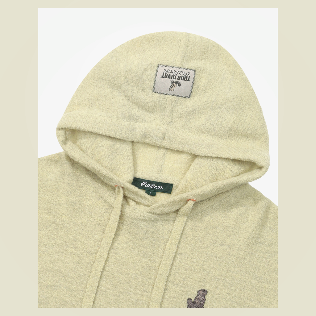 Malbon Studio Seoul Tour Divot Hoodie Khaki golf apparel hood and chest detail
