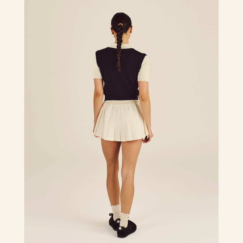 Malbon Veronica Polo BLACK ONYX / CREAM women's golf polo detail view